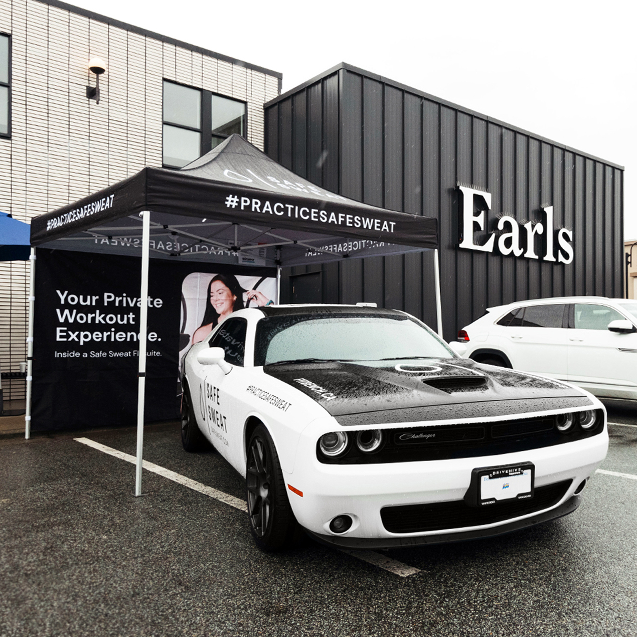 Safe Sweat's Dodge Challenger parked infront of Earls