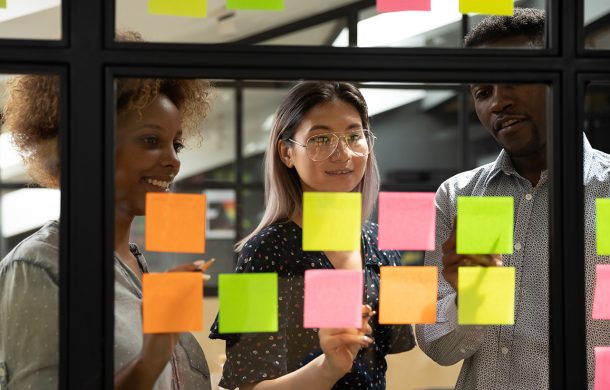 A group of employees brainstorming at work